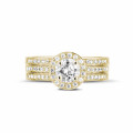 0.70 karaat diamanten solitaire ring in geel goud met zijdiamanten