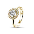 1.00 karaat Halo solitaire ring in geel goud met ronde diamanten