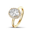 1.00Ct halo ring in geel goud met ovale diamant