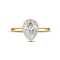 1.00Ct halo ring in geel goud met peervormige diamant