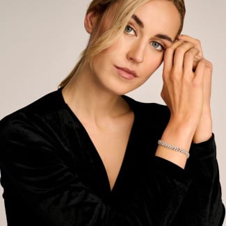 Huwelijksjuwelen - 9.50 karaat diamanten armband in wit goud met visgraat design