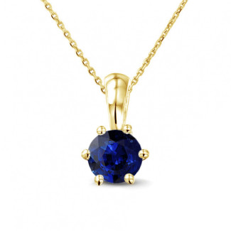 Juwelen met robijn, saffier en smaragd - Solitaire hanger in geel goud met ronde saffier