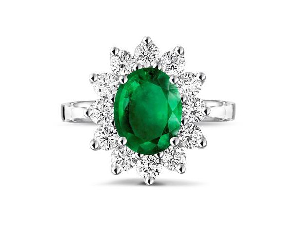 Emerald diamond ring on white background