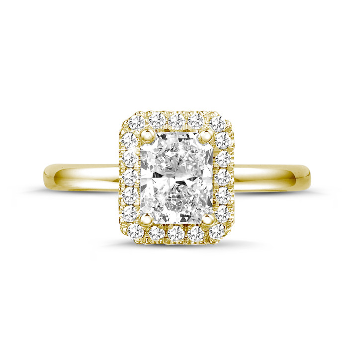 0.70 karaat Halo solitaire ring met een radiant cut diamant in geel goud met ronde diamanten