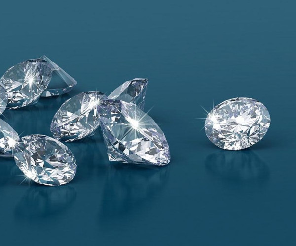 glinsterende geslepen diamanten op een blauwe achtergrond