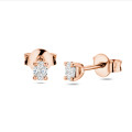 0.30 karaat solitaire oorbellen met ovaal geslepen diamanten in roodgoud