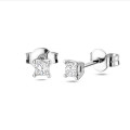 0.30 karaat solitaire oorbellen met princess geslepen diamanten in witgoud