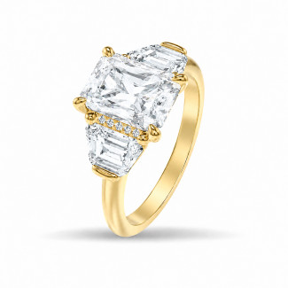 Op maat gemaakte trilogie-ring met een diamant in radiant-slijpvorm