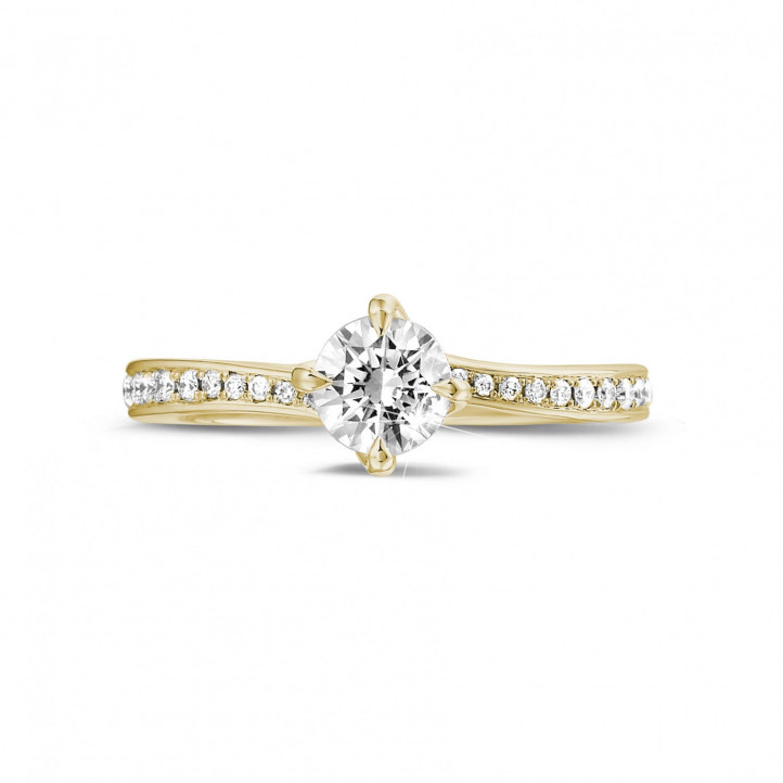 0.50 karaat diamanten solitaire ring in geel goud met zijdiamanten