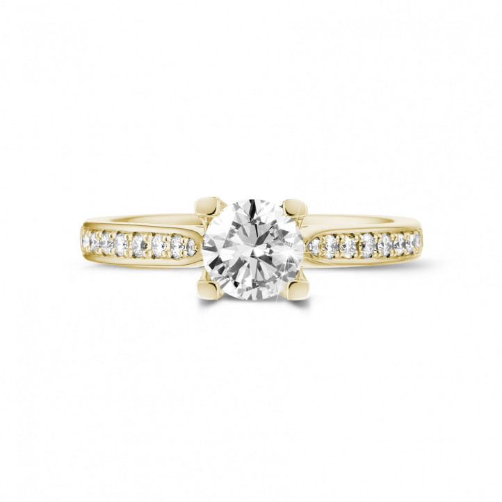0.70 karaat diamanten solitaire ring in geel goud met zijdiamanten