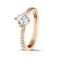 0.70 karaat diamanten solitaire ring in rood goud met zijdiamanten