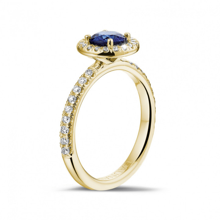 Halo solitaire ring in geel goud met ronde saffier en kleine ronde diamanten