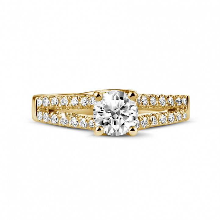 0.50 karaat solitaire ring in geel goud met zijdiamanten