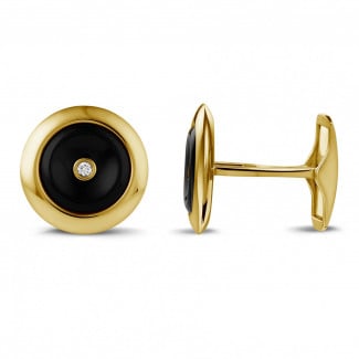 Mannen sieraden - Geelgouden manchetknopen met onyx en een centrale diamant