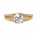 1.00 karaat solitaire ring in geel goud met zijdiamanten