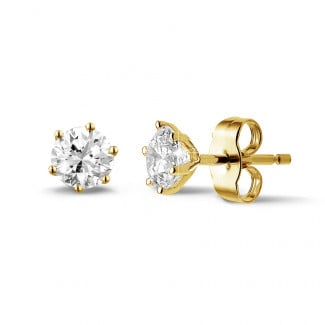 Oorbellen - 1.00 karaat klassieke diamanten oorbellen in geel goud met zes griffen