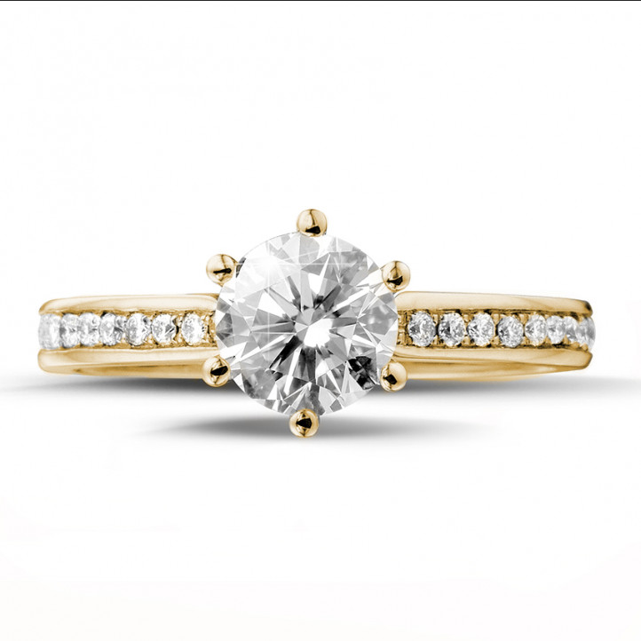 1.00 karaat diamanten solitaire ring in geel goud met zijdiamanten