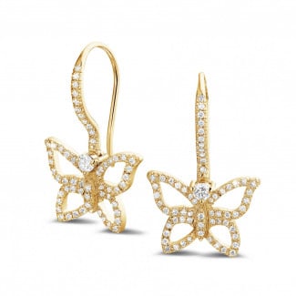 Oorringen - 0.70 karaat diamanten design vlinder oorbellen in geel goud