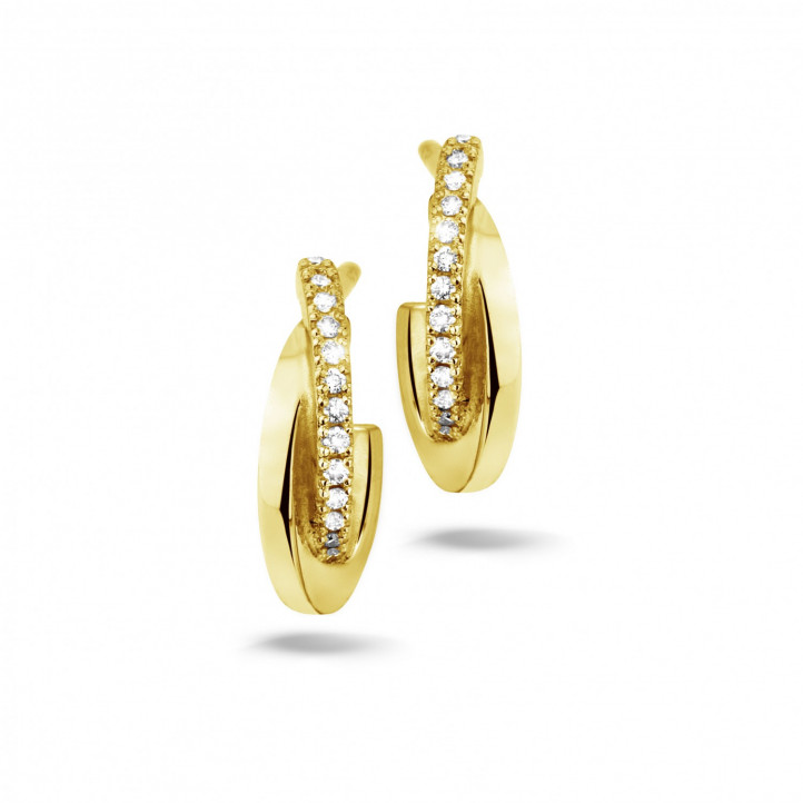 0.20 karaat diamanten design oorbellen in geel goud
