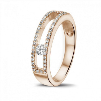 Ringen - 0.25 karaat ring in rood goud met zwevende ronde diamant
