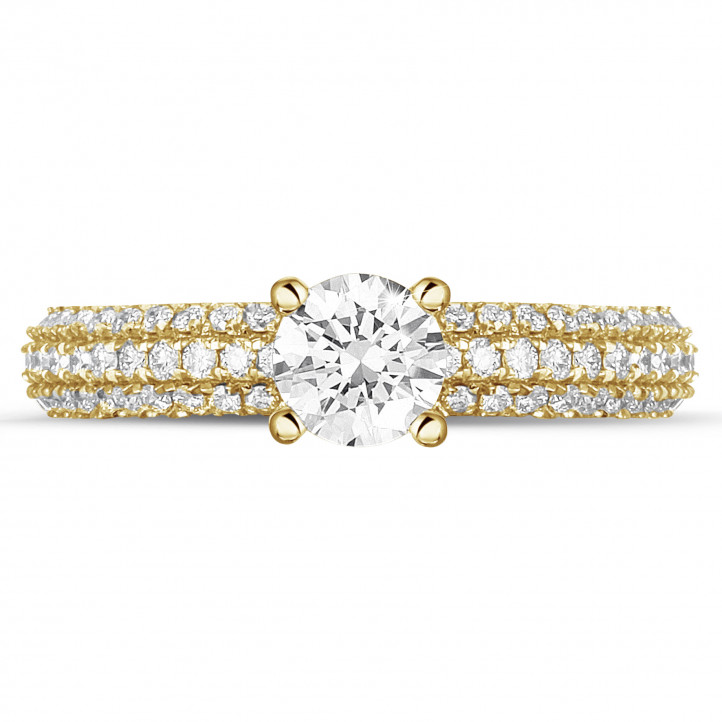 0.50 karaat solitaire ring (volledig rondom gezet) in geel goud met zijdiamanten