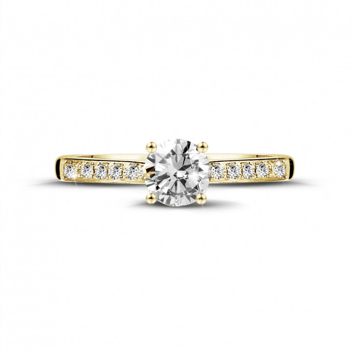 0.50 karaat solitaire ring in geel goud met vier griffen en zijdiamanten