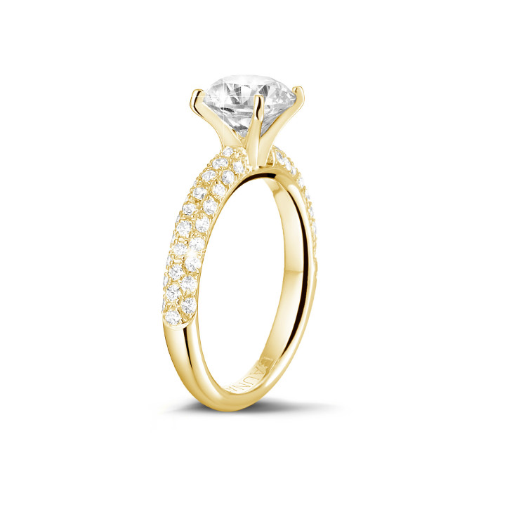 0.90 karaat solitaire ring (half gezet) in geel goud met zijdiamanten