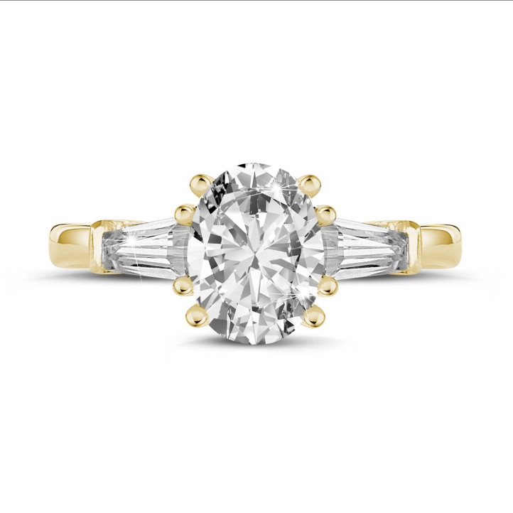 1.50 karat sarı altından oval pırlantalı ve konik bagetli üçleme yüzük
